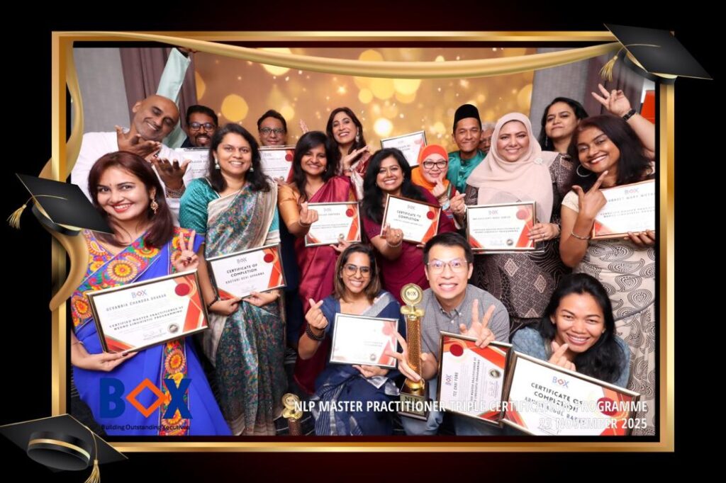 A group of participants holding NLP master practitioner cert