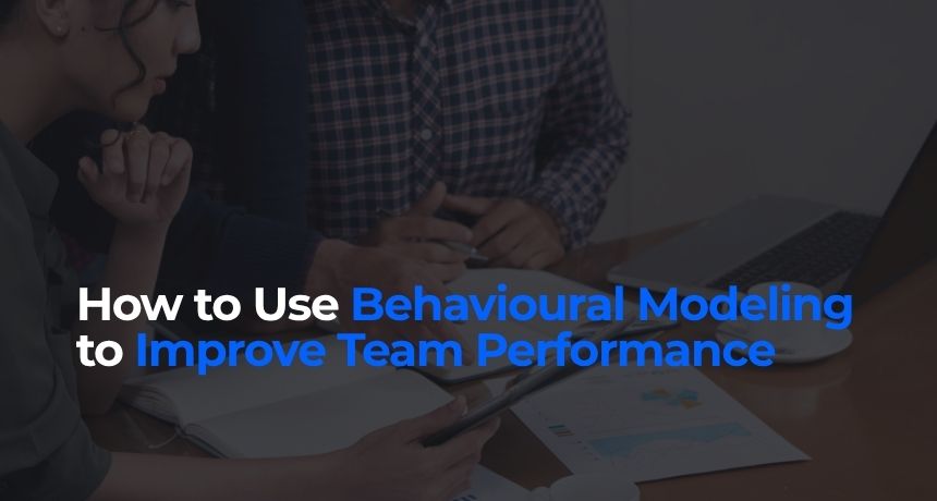 Photo of a performance review with the employer talking about behaviour modeling